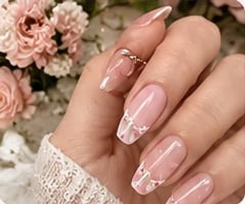 Pink nail care and tips guide with coquette bow, cherry, floral French tip and butterfly nail art ideas